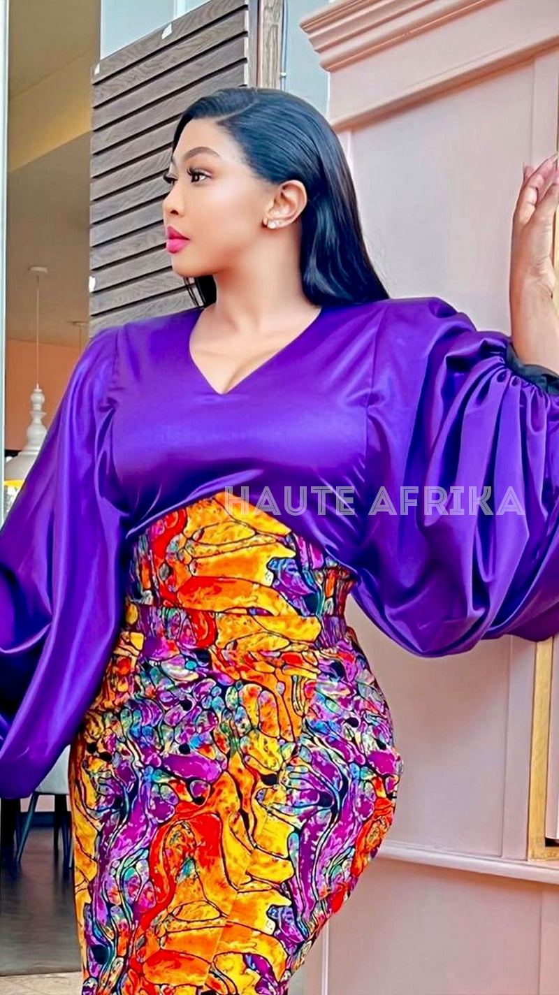 Ayanda 2 Pieace colored purple with a skirt colored red orange and purple mixture African print
